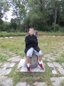 Grandson, Carson, sitting in the center of the garden.